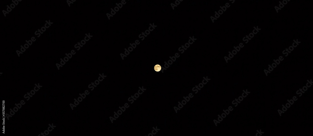 Full moon in the black sky. Mysterious photo. Full moon in the black sky. Mysterious photo.