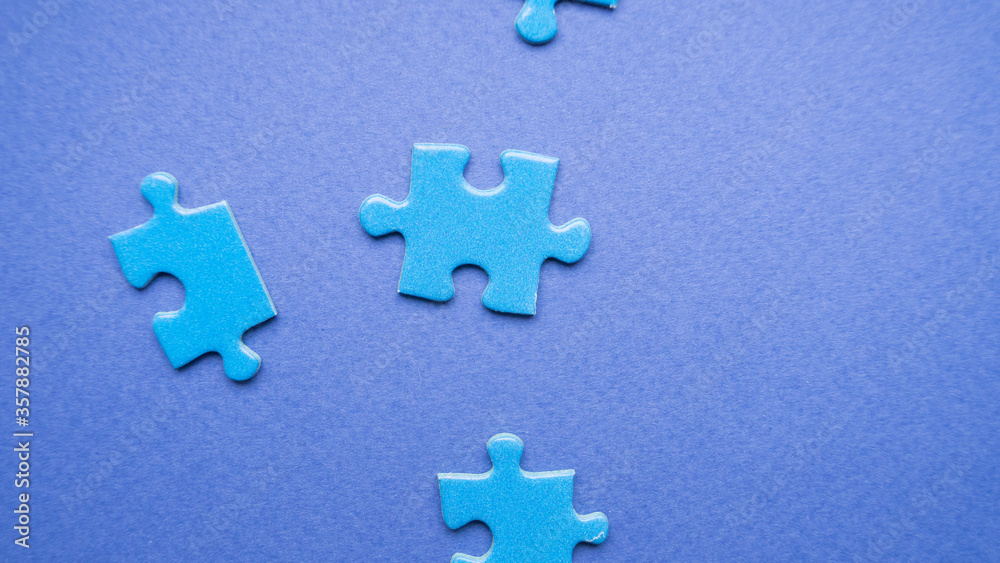 Obraz premium blue puzzle pieces. blue puzzle