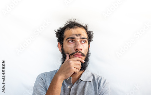 Working guy with coal dust on his face sitting and thinking about some ideas