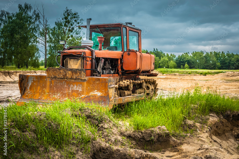 An old dozer on sand excavations. An old dozer on sand excavations.