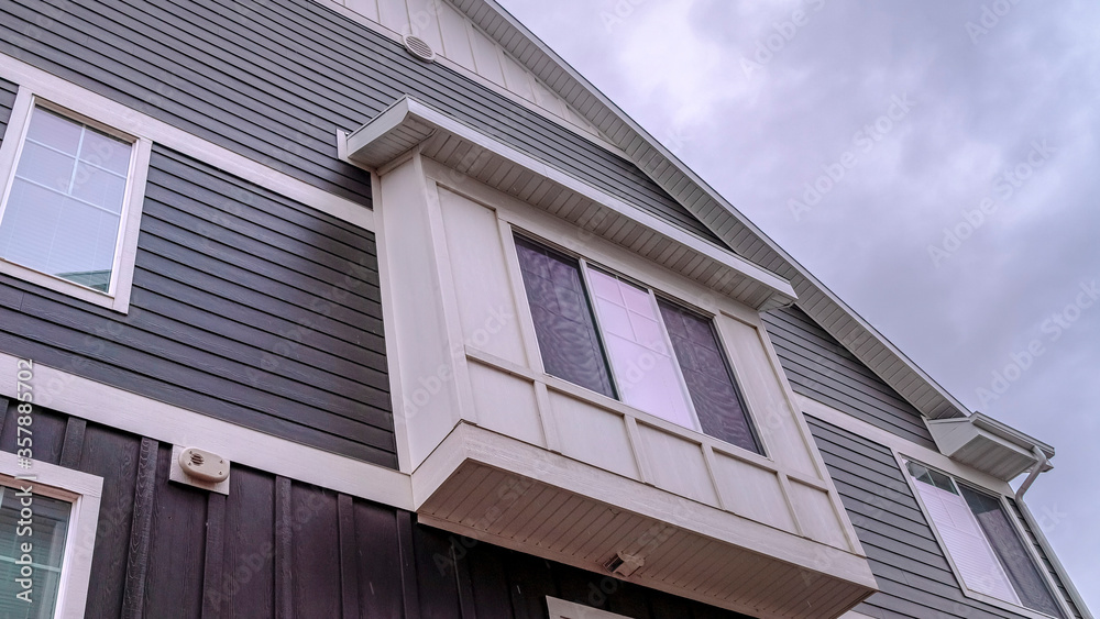 Panorama House facade with narrow balcony day light Panorama House facade with narrow balcony day light