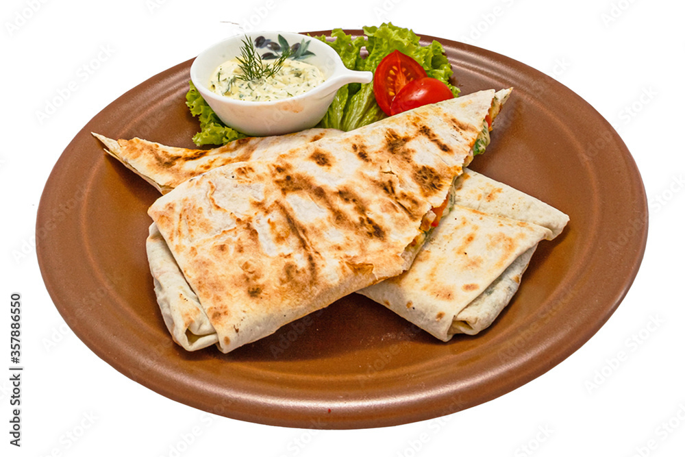 A delicious doner donair kebab wrap with spicy meat A delicious doner donair kebab wrap with spicy meat