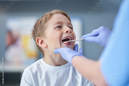 Portrait of adorable little boy having doctor's appointment