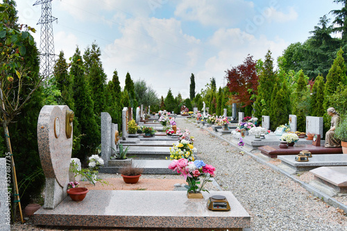 Line of many graves in the cemetery