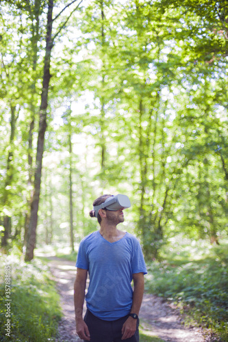 Man in Forest With VR Headset
