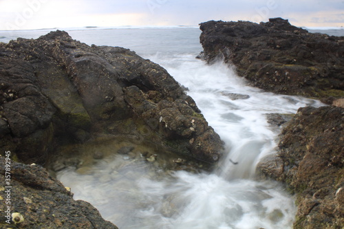 waves crashing on rocks