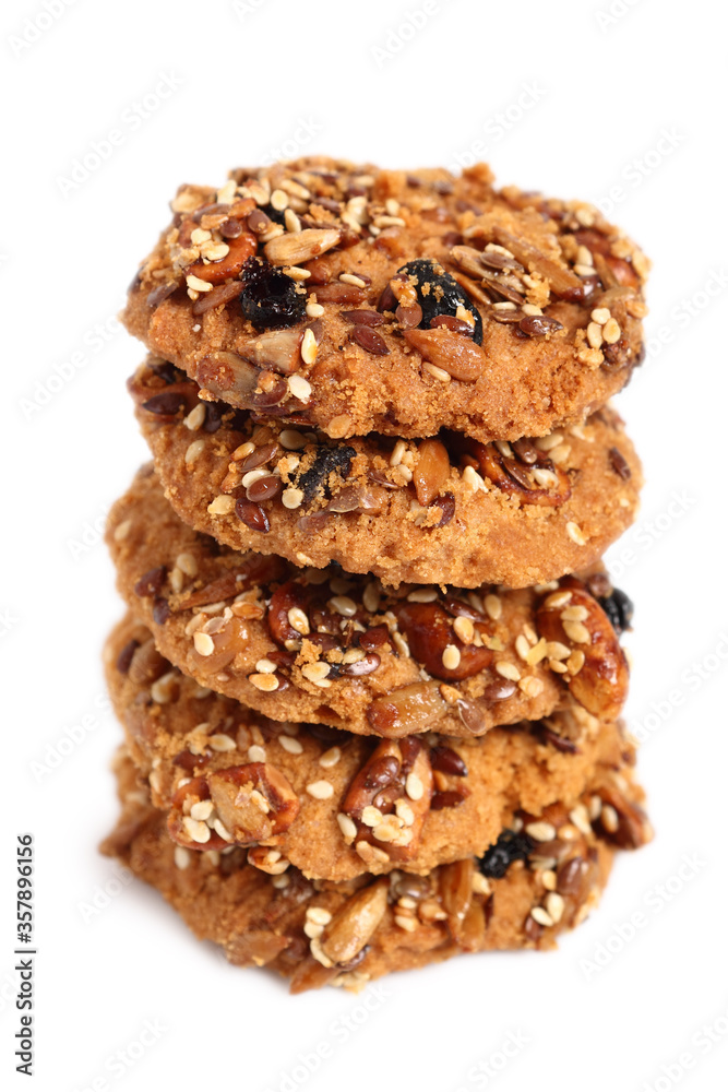 Stack of Multi seed cookies. Isolated on white background.