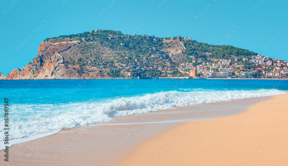 Obraz premium Ancient shipyard near of Red tower ( Kizil Kule) in Alanya peninsula with amazing beach - Antalya, Turkey