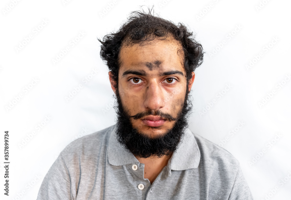 Arabic man with coal on his face having a bad day Arabic man with coal on his face having a bad day