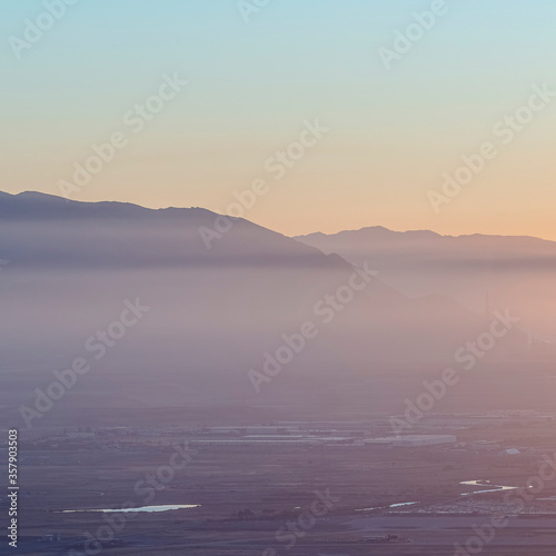 Square Wide foggy valley landscape in the morning © Jason