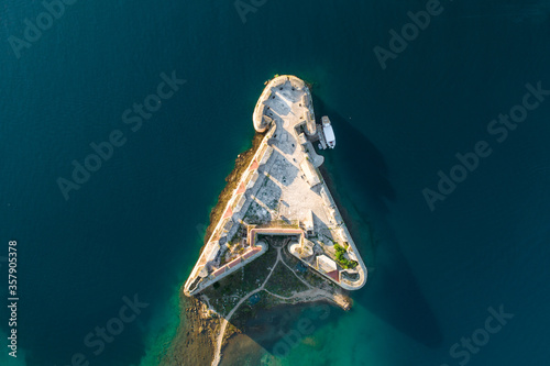 Top down view of a triangular castle on an island in Croatia