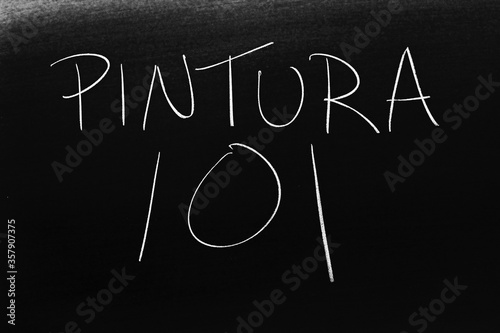 The words Pintura 101 on a blackboard in chalk.  Translation: Painting 101 photo