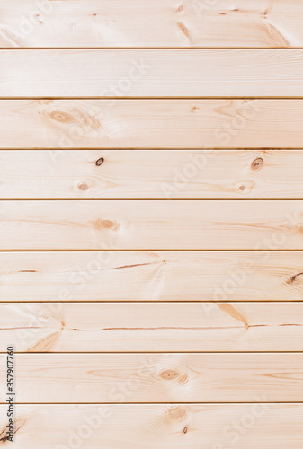 Vertical background with horizontal wooden boards. House wall 