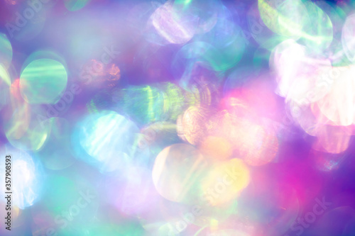 Abstract holographic trendy background. Magical bokeh overlay or a design element.