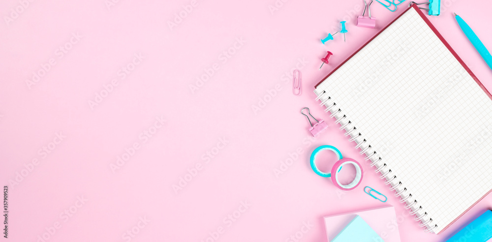 School office supplies on pink background. Back to school concept. Top view. Copy space School office supplies on pink background. Back to school concept. Top view. Copy space