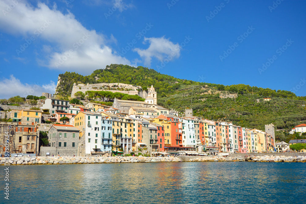 The colorful village of Portovenere Italy, on the Ligurian coast near the Cinque Terre. View from the sea on a summer day.