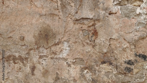Close up uneven plaster surface texture background. horizontal rough abstract surface texture.