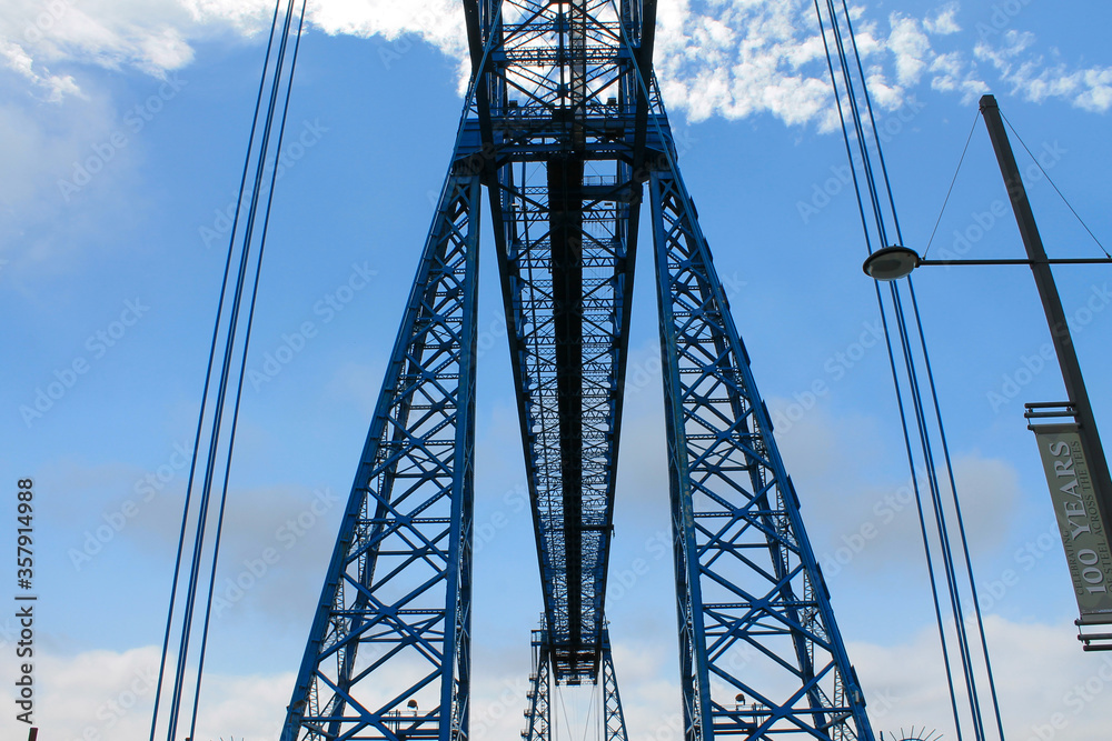 The Tees Transporter Bridge at Middlesbrough. Showing the gondola bridge and the surrounding dock area.