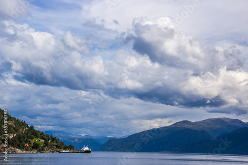  clouds over the fjord in the mountains of Norway © tmag