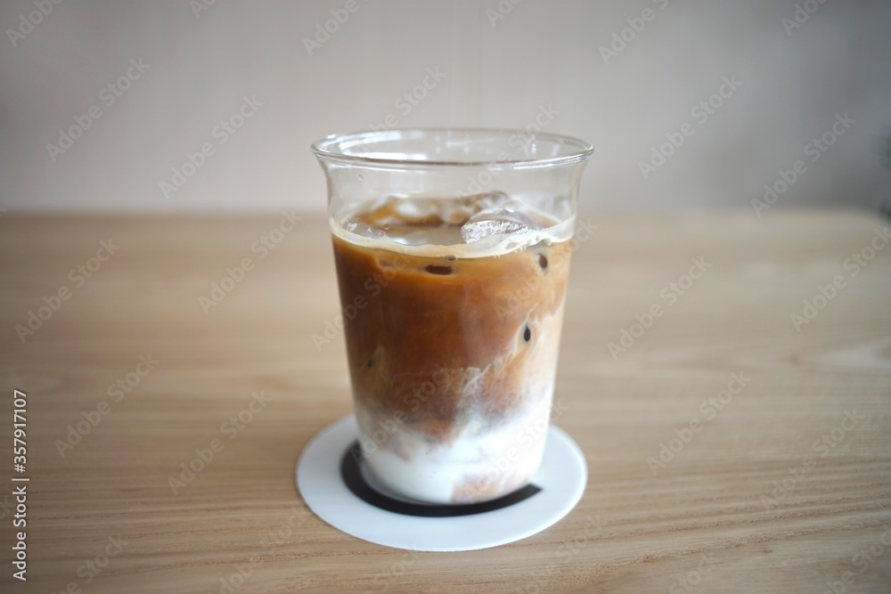 Iced Latte coffee in a grass Iced Latte coffee in a grass