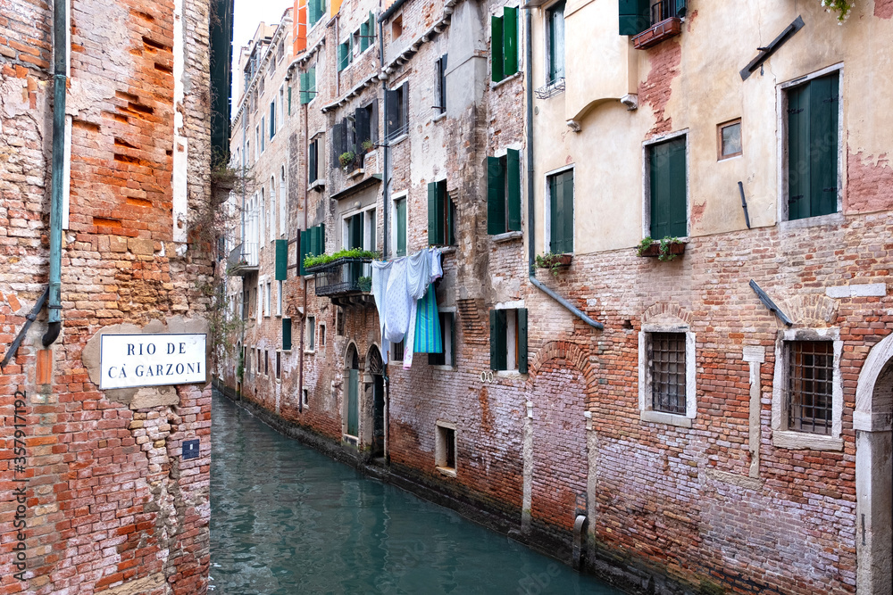 laundry hanging in venice canal