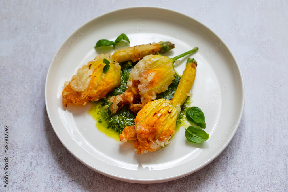 Fried courgette flowers stuffed with ricotta cheese in light tempura batter Fried courgette flowers stuffed with ricotta cheese in light tempura batter