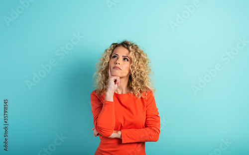Confused woman have to choose something. concept of options, confusion, decision.
