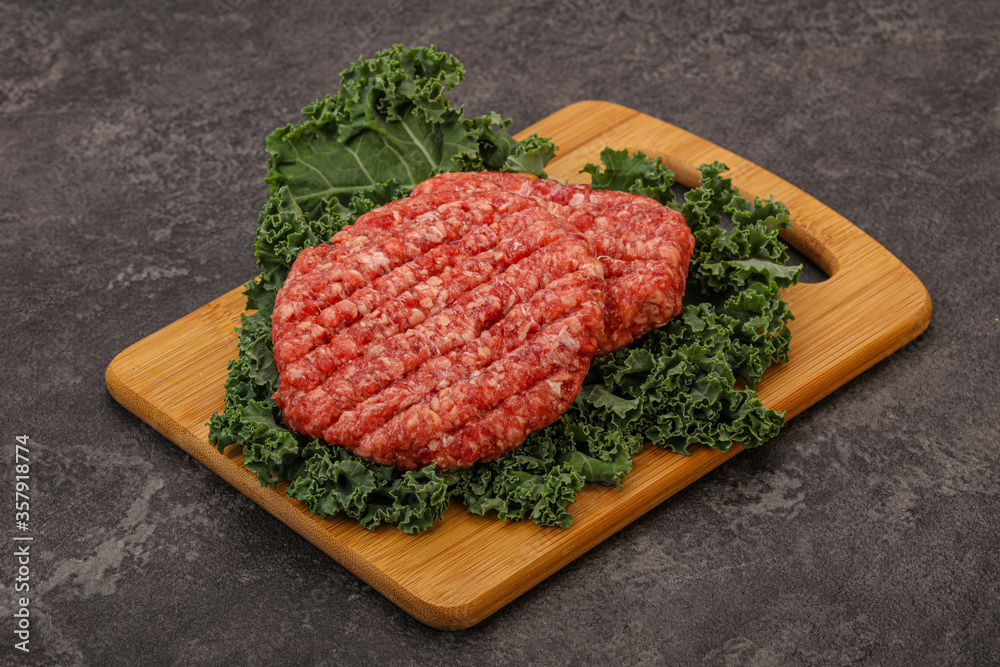 Raw beef burger cutlet for cooking