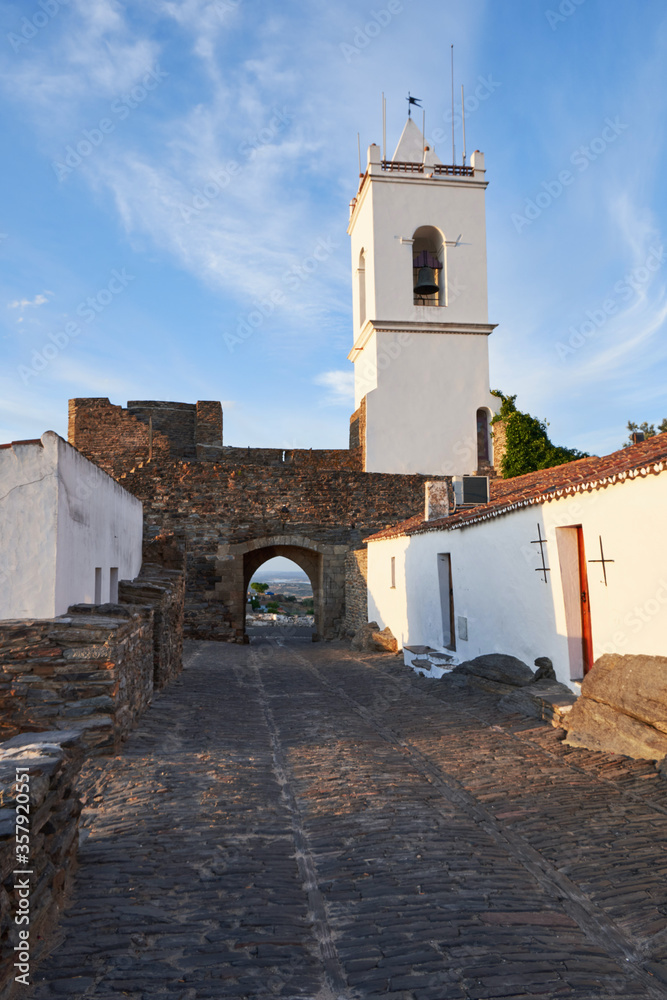 Street with white houses in Monsaraz, a village inside castle walls, Alentejo, Portugal 