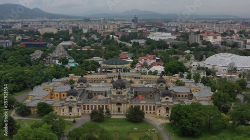 One of the largest spa complexes of the Szechenyi Thermal Bath in the Budapest City Park. In the background is the capital's Great Circus, as well as the capital's Zoo. Budapest, Hungary / 06.11.2020.