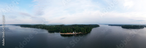 boat mooring on the river at sunrise filmed from a drone