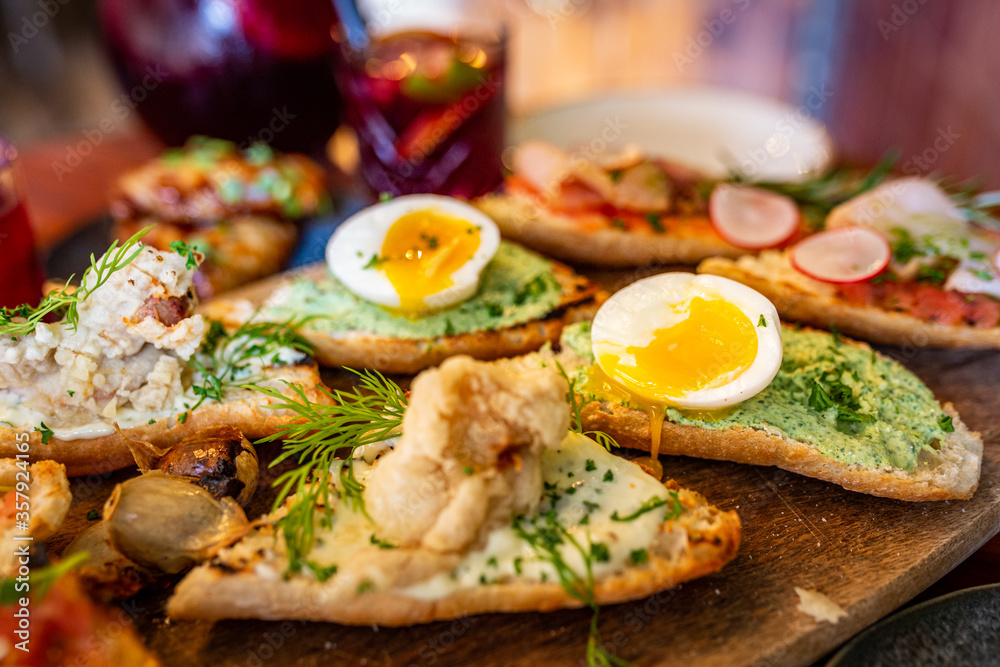 Spanish sandwiches on a platter at a restaurant Spanish sandwiches on a platter at a restaurant
