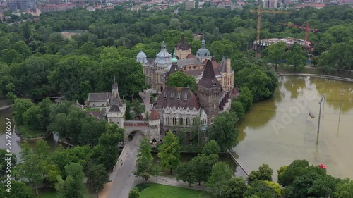 Beautiful views of Vajdahunyad Castle. In front of it is the city park, the boating lake. Tourist attraction without tourists in the coronavirus period. Drone recording.