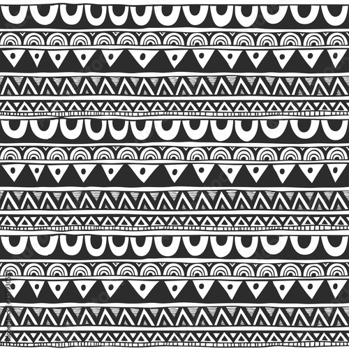 Seamless ornament from circle geometric elements in ethnic style black and white. Seamless vector pattern