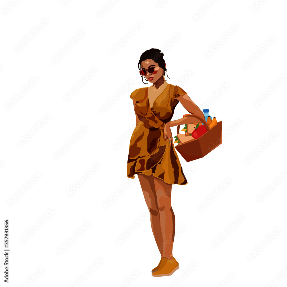 Elegant girl in a yellow ocher dress carries a basket Elegant girl in a yellow ocher dress carries a basket