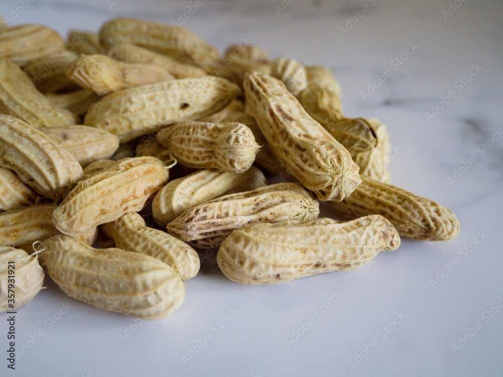 Peanut good natural sources of protein and healthy snacks for weight loss. Peanut on white background Peanut good natural sources of protein and healthy snacks for weight loss. Peanut on white background