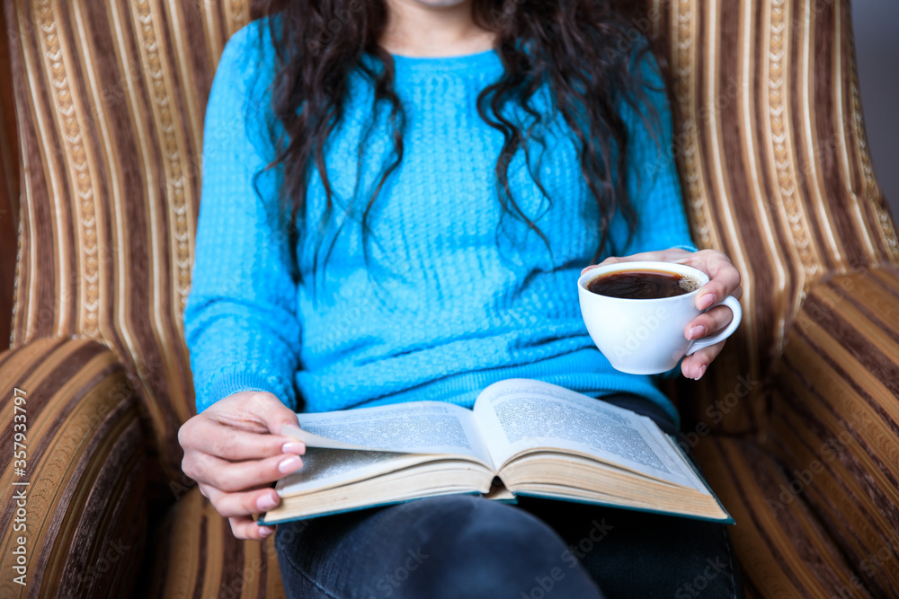 Obraz premium woman hand coffee and book