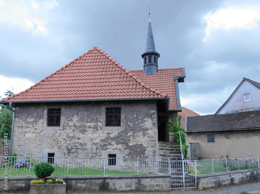 Historical chapel of the estate in the village of Helmscherode, Bad Gandersheim Germany, built from quarry stones, formerly reserved for the family of the owner, now accessible to all residents Historical chapel of the estate in the village of Helmscherode, Bad Gandersheim Germany, built from quarry stones, formerly reserved for the family of the owner, now accessible to all residents