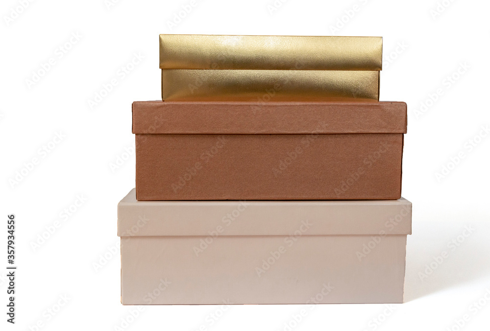 Three isolated boxes standing on each other. Beautifully colored boxes stack