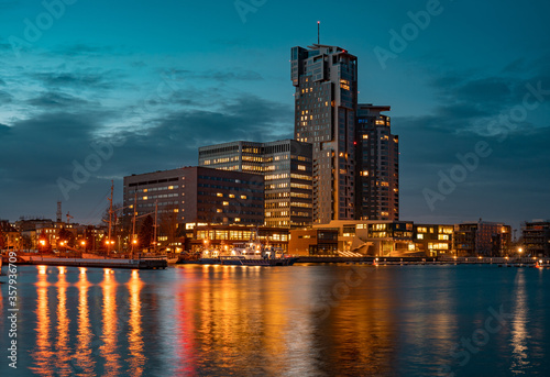 Modern architecture of Sea Towers skyscraper at night in Gdynia, Poland. 