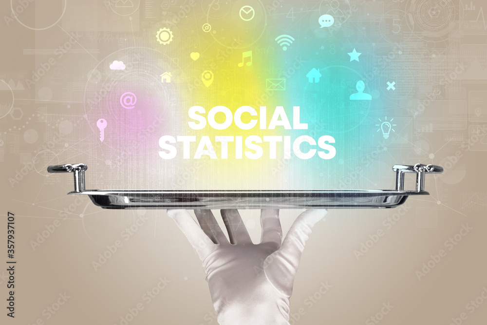Waiter serving social networking with SOCIAL STATISTICS inscription, new media concept Waiter serving social networking with SOCIAL STATISTICS inscription, new media concept