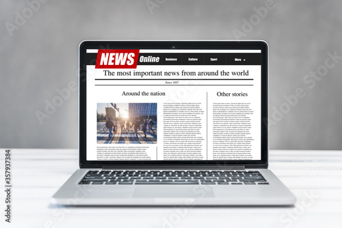 Wallpaper Mural news on a computer screen. Mockup website. Newspaper and portal on internet. Torontodigital.ca