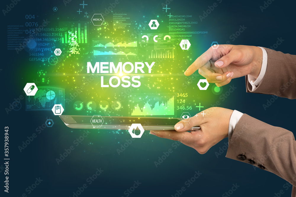 Close-up of a touchscreen with MEMORY LOSS inscription, medical concept Close-up of a touchscreen with MEMORY LOSS inscription, medical concept