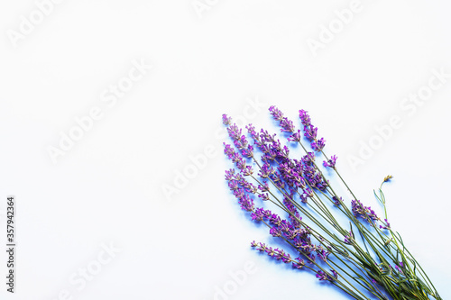 Bouquet of lavender flowers on grey background  top view  copy space