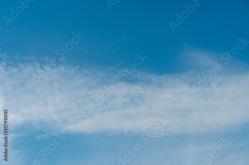 fluffy clouds on a blue background
