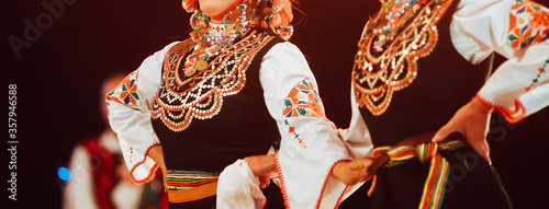 Yugoslav dancers in folkloric national costumes  photo