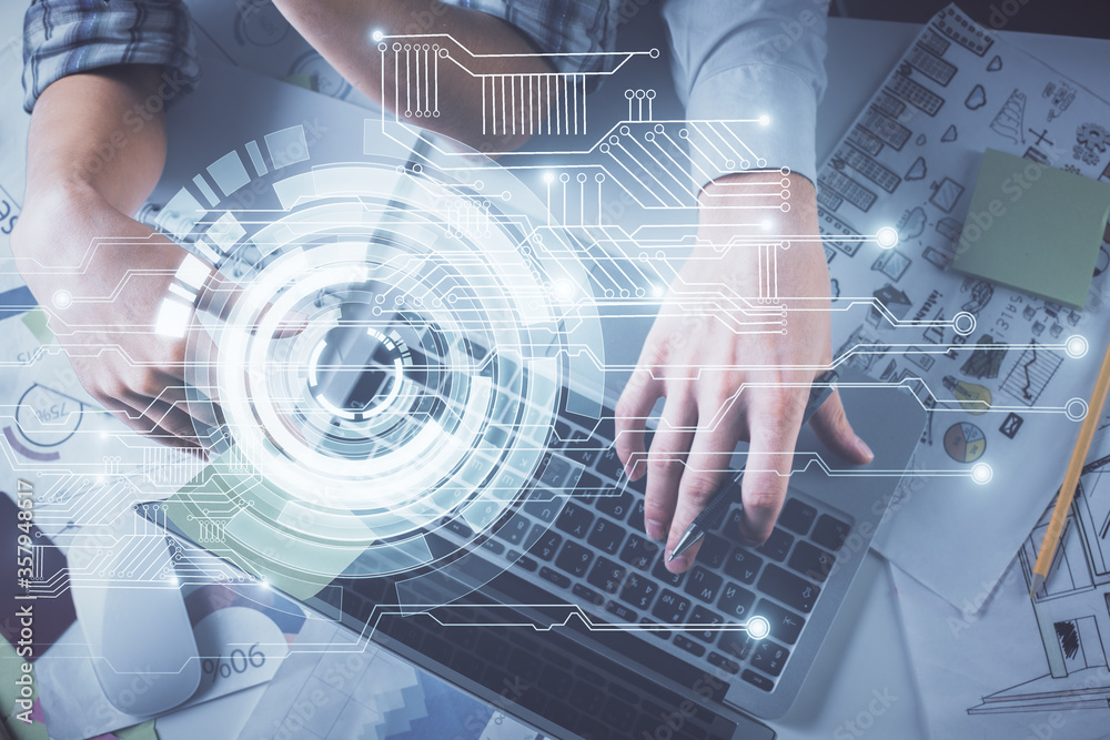 Double exposure of man and woman working together and data theme hologram drawing. Computer background. Top View. Double exposure of man and woman working together and data theme hologram drawing. Computer background. Top View.