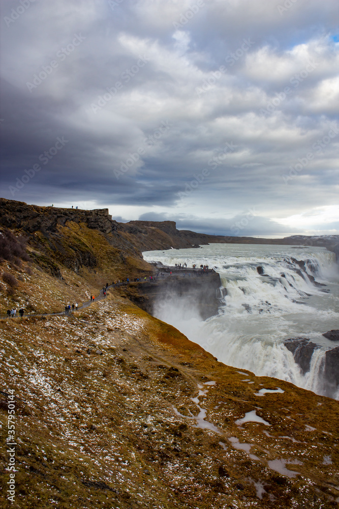 A Hiking Trail Winds through the Tundra Covered Cliffs at the Gulfoss Waterfall in the Golden Circle of Iceland