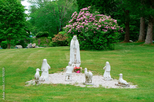 The statues of Virgin Mary and three shepherd children in Our Lady of Fatima Shrine Massachusetts USA