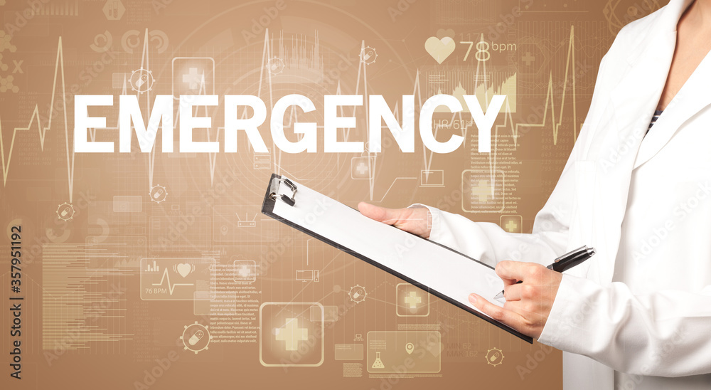 young doctor writing down notes with EMERGENCY inscription, healthcare concept young doctor writing down notes with EMERGENCY inscription, healthcare concept